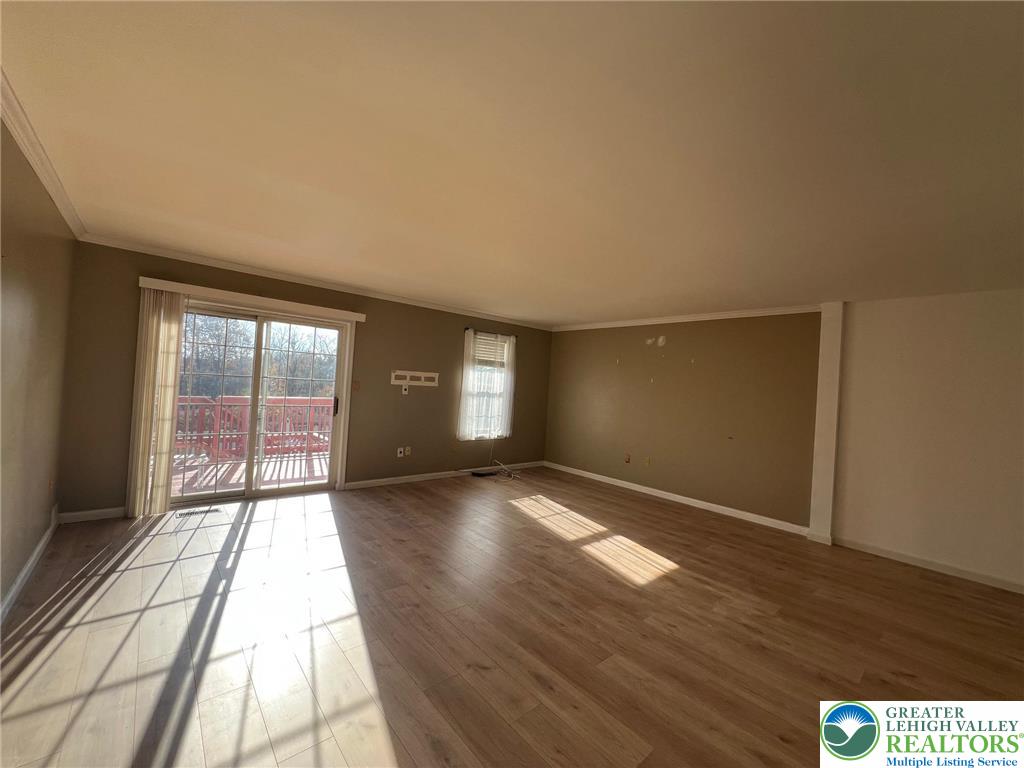 32 Corriere Road Easton, PA 18045 - Photo 14 of 14 a view of an empty room with wooden floor and a window