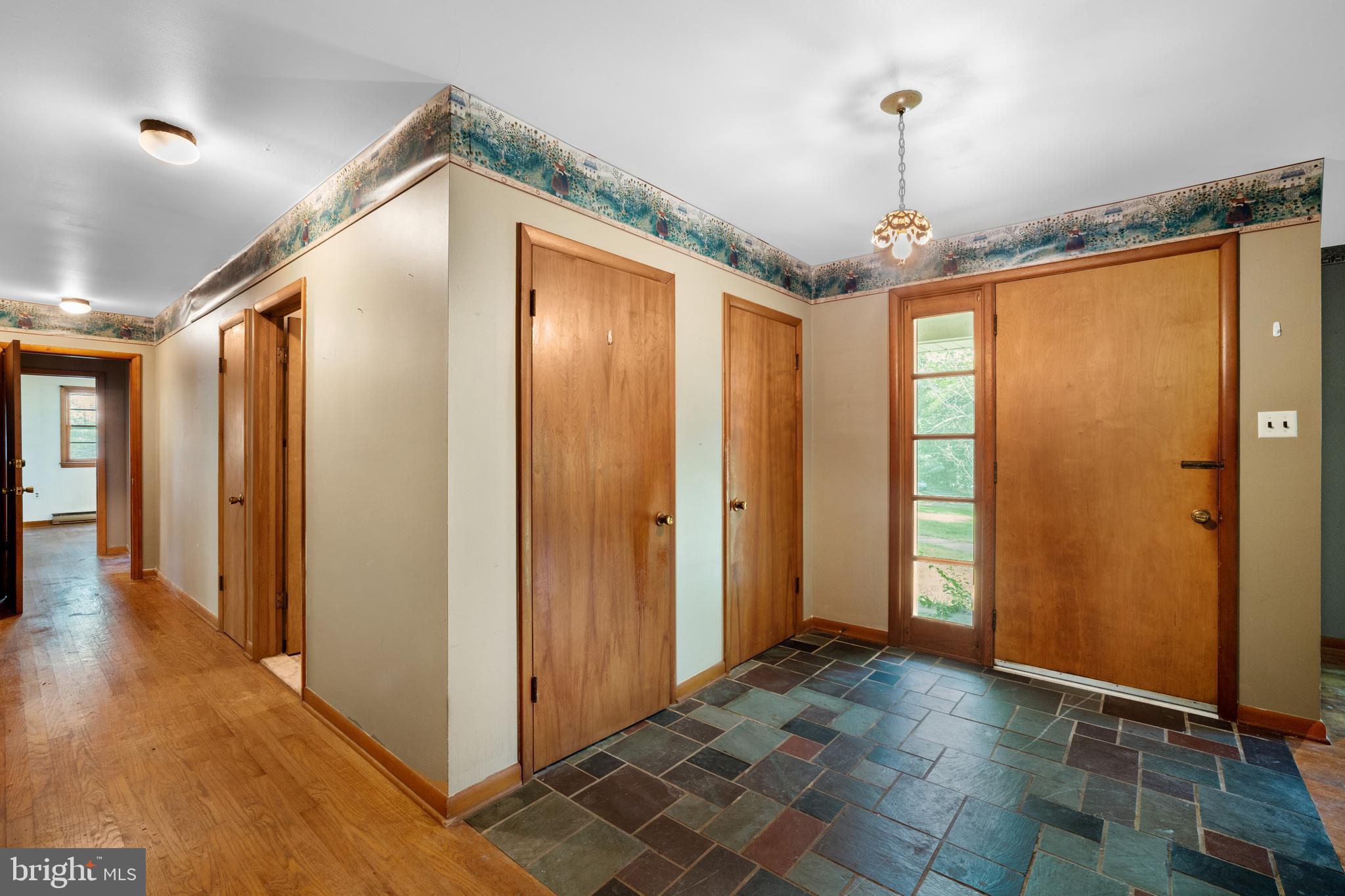 2170 Old Dairy Farm Road Gambrills, MD 21054 - Photo 5 of 47 Foyer with slate floor and dual coat closets