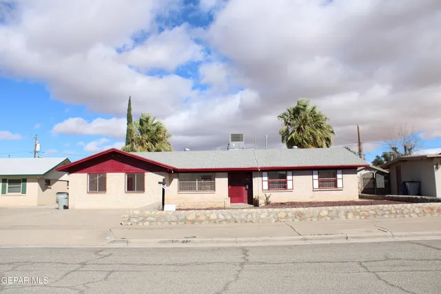 a view of house with yard
