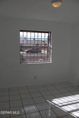 a view of an empty room and window