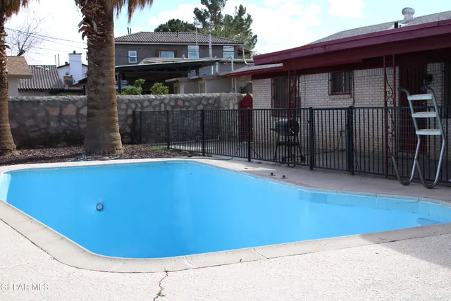 a view of roof deck with patio