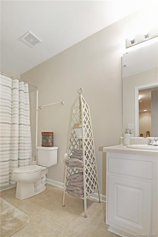 615 Potter Place Road Fort Mill, SC 29708 - Photo 14 of 25 a bathroom with a toilet sink and mirror
