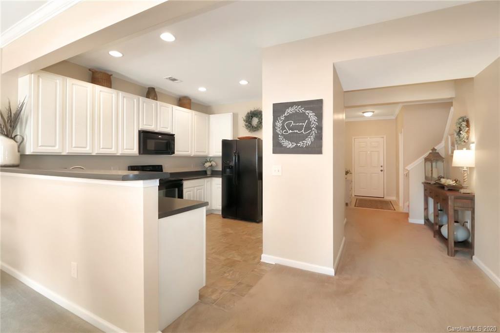 615 Potter Place Road Fort Mill, SC 29708 - Photo 5 of 25 a kitchen with refrigerator and microwave