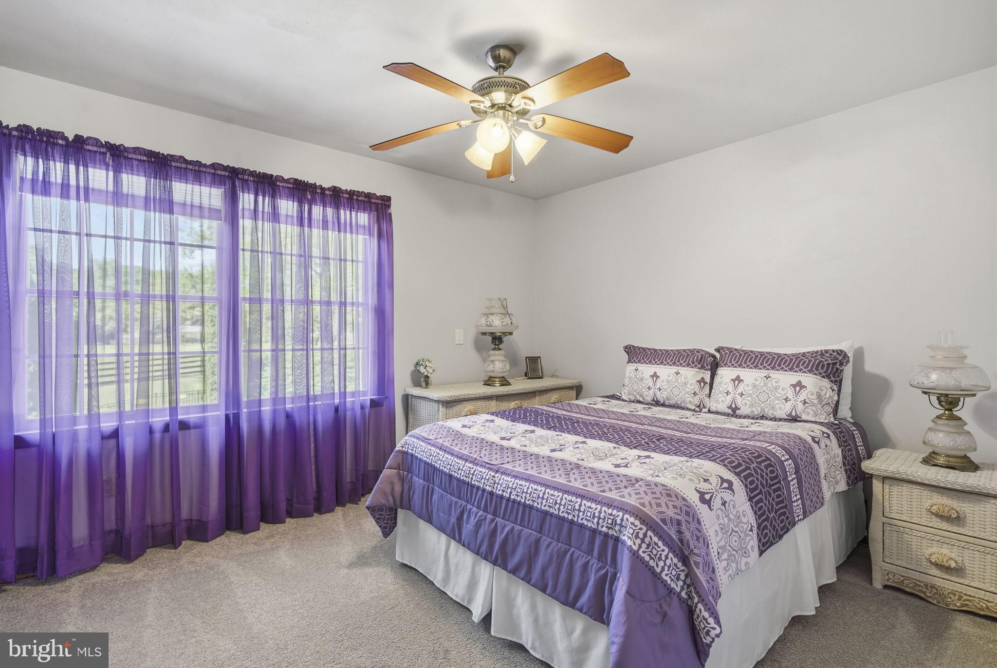 26 Ellisdale Road Allentown, NJ 08501 - Photo 26 of 45 Serene bedroom with purple accents.