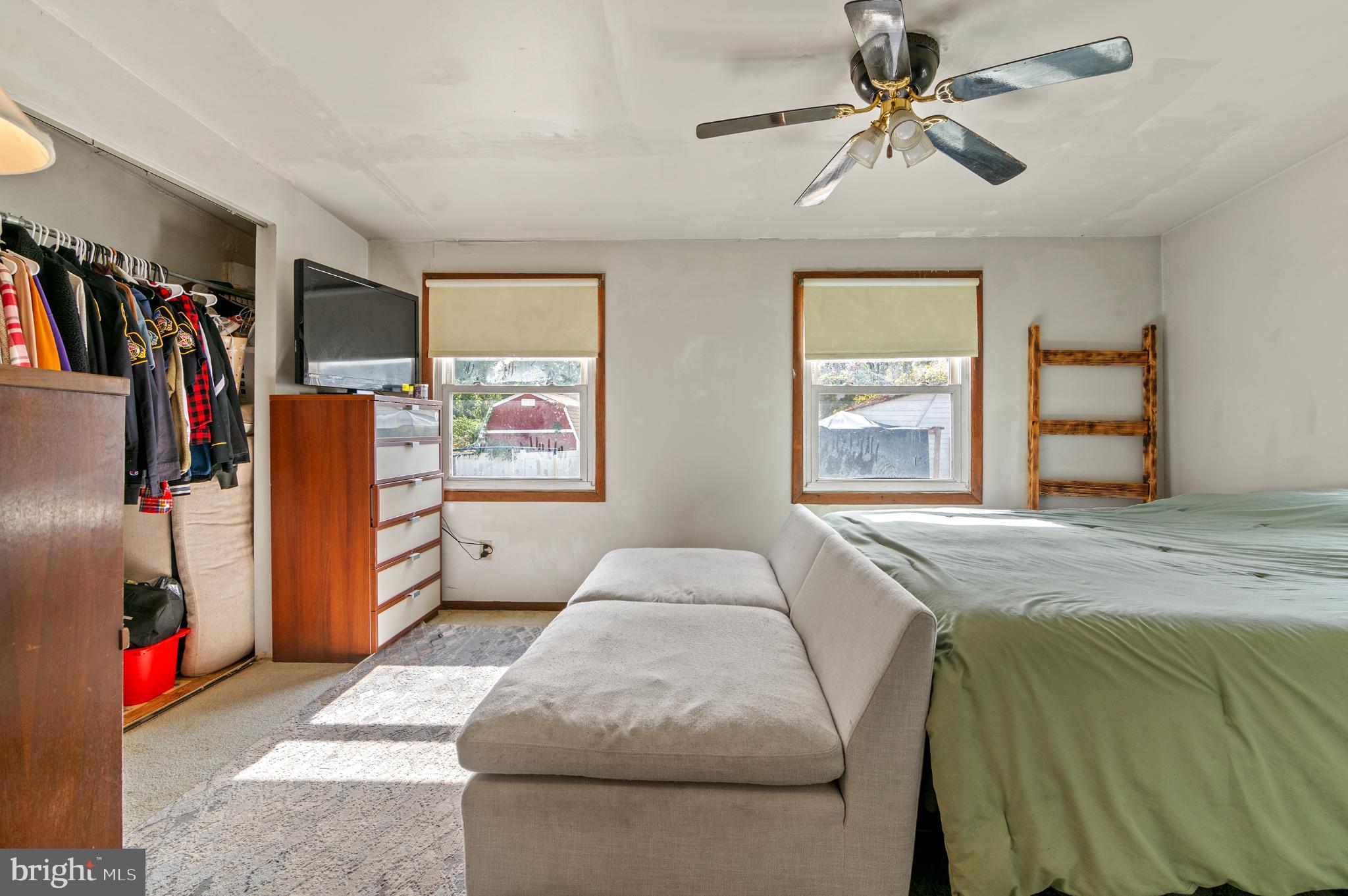 3 Compression Court Middle River, MD 21220 - Photo 15 of 27 a bedroom with a bed dresser and a window