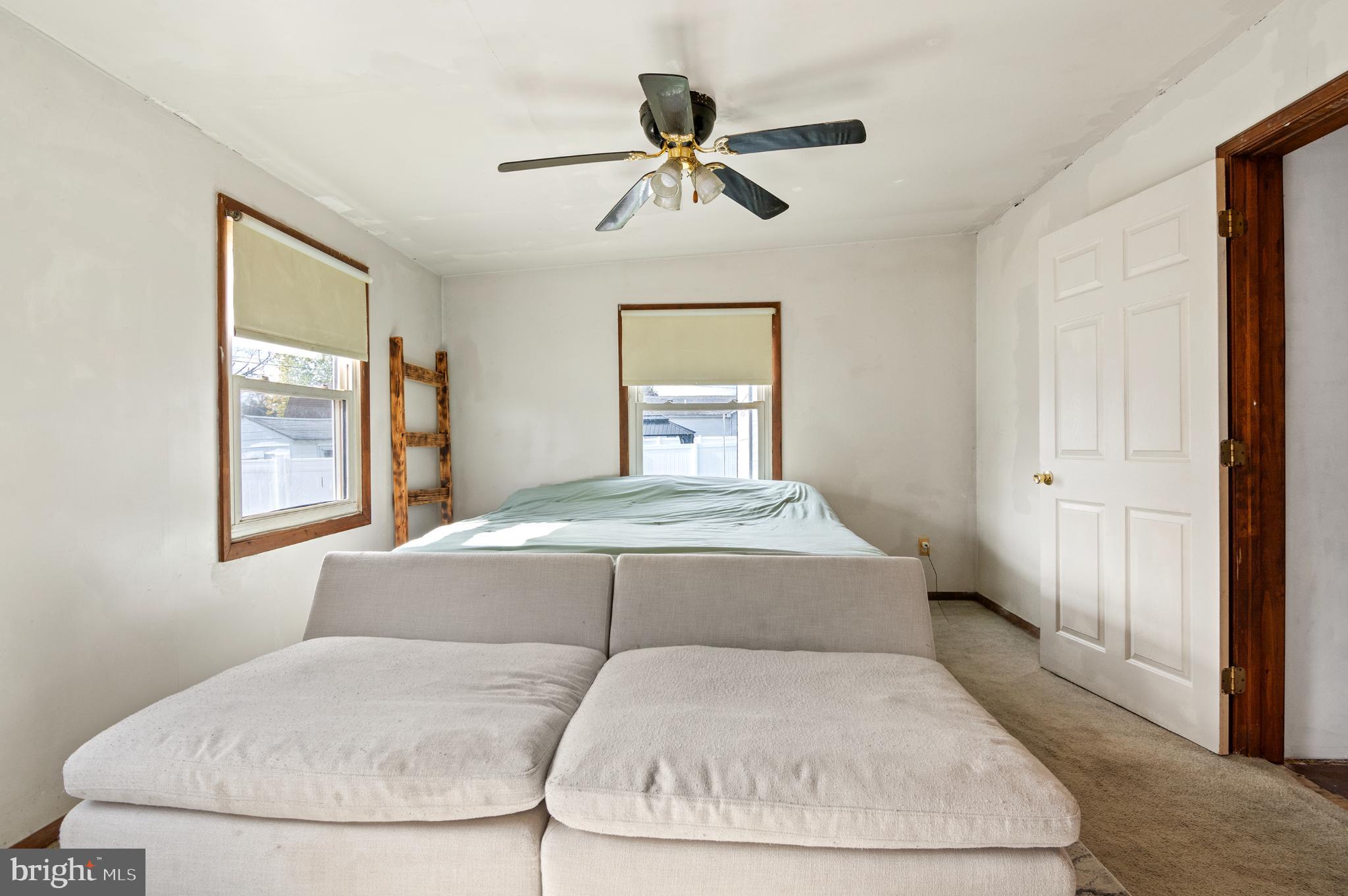 3 Compression Court Middle River, MD 21220 - Photo 16 of 27 a bedroom with a bed and window