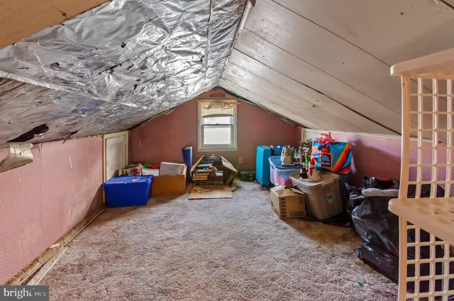 a view of livingroom with furniture and toys