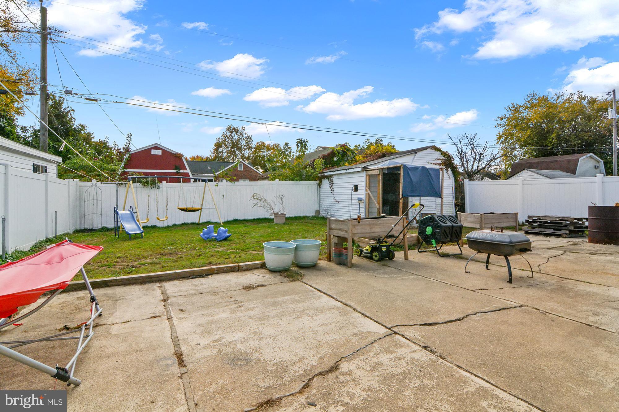3 Compression Court Middle River, MD 21220 - Photo 25 of 27 a view of a house with backyard and sitting area