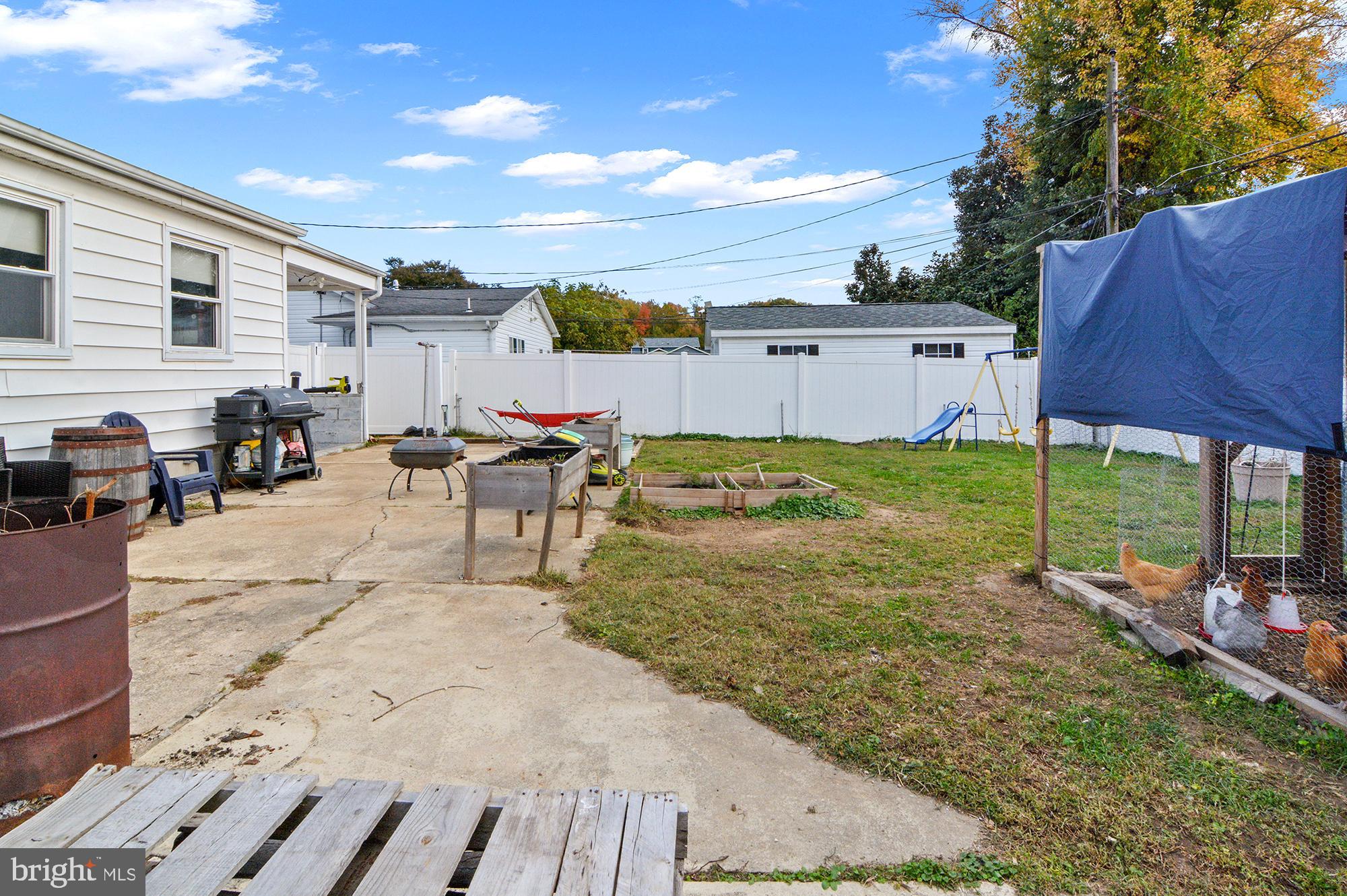 3 Compression Court Middle River, MD 21220 - Photo 27 of 27 a view of a backyard with furniture