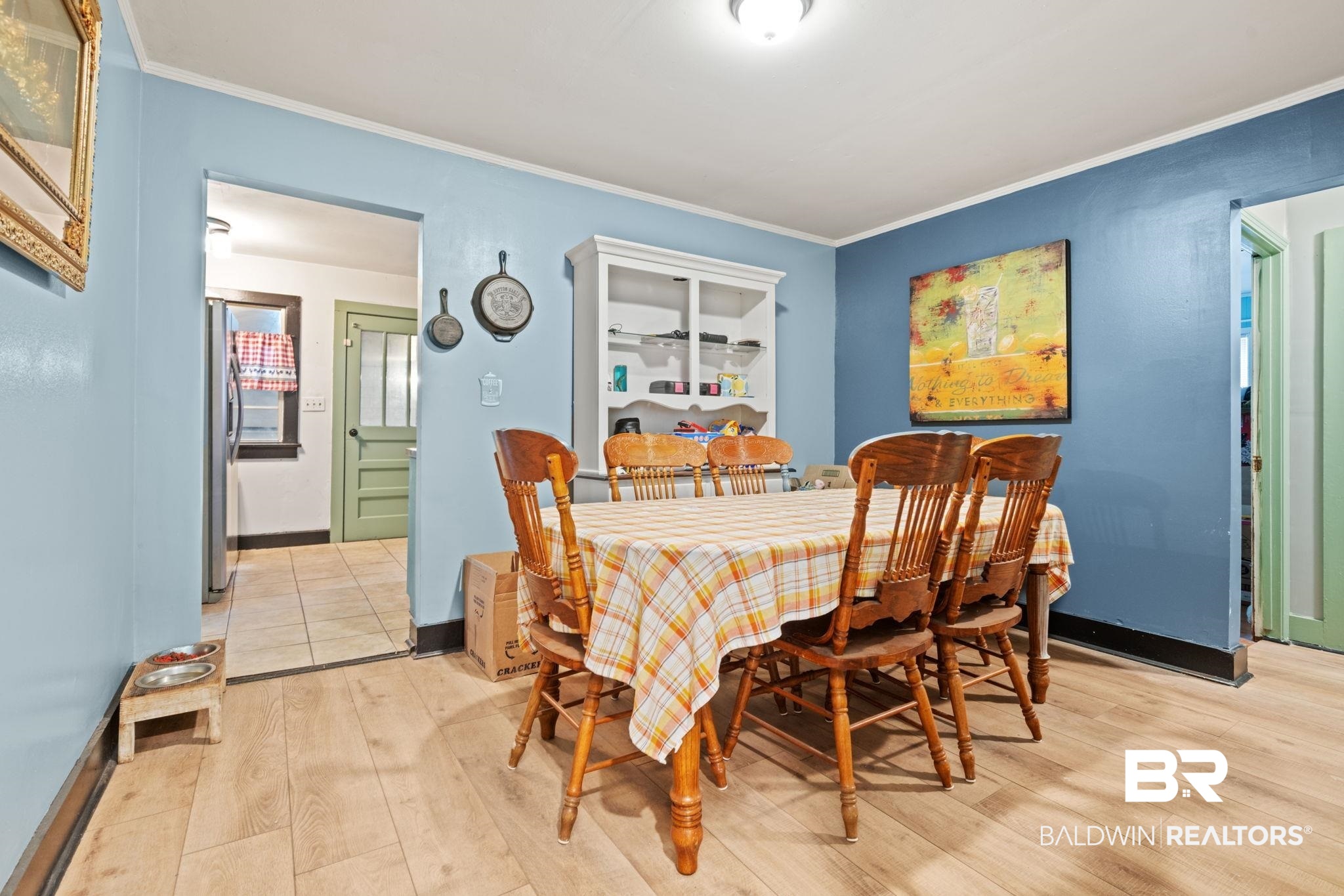305 Alpine Street Mobile, AL 36611 - Photo 9 of 21 Dining space with crown molding and light wood-type flooring