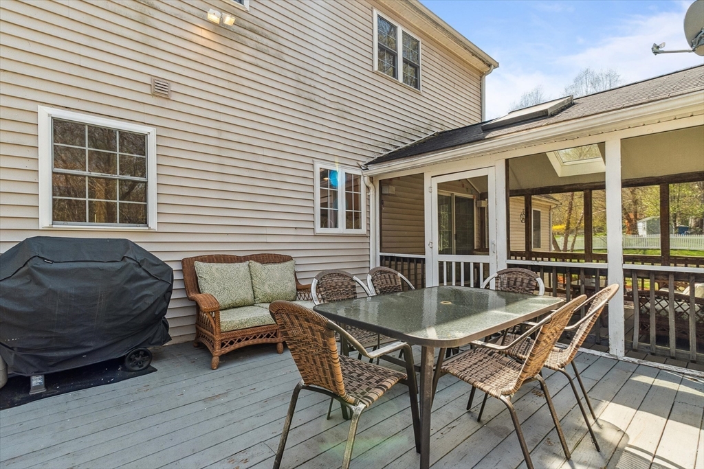 10 Falls Brook Road Hudson, MA 01749 - Photo 21 of 42 a view of a house and outdoor seating