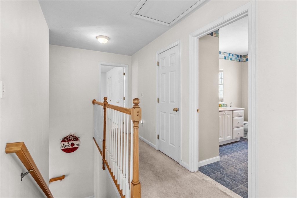 10 Falls Brook Road Hudson, MA 01749 - Photo 23 of 42 a view of a hallway with closet area