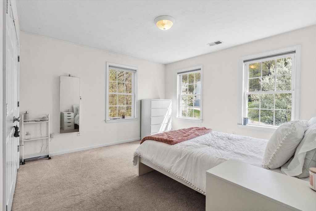 10 Falls Brook Road Hudson, MA 01749 - Photo 25 of 42 a bedroom with a bed and window