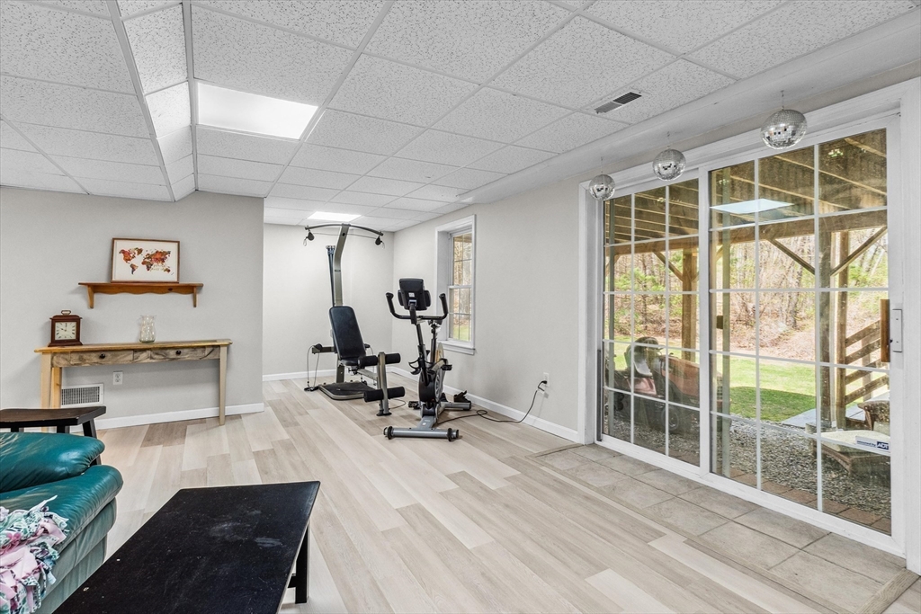 10 Falls Brook Road Hudson, MA 01749 - Photo 32 of 42 a view of a room with gym equipment