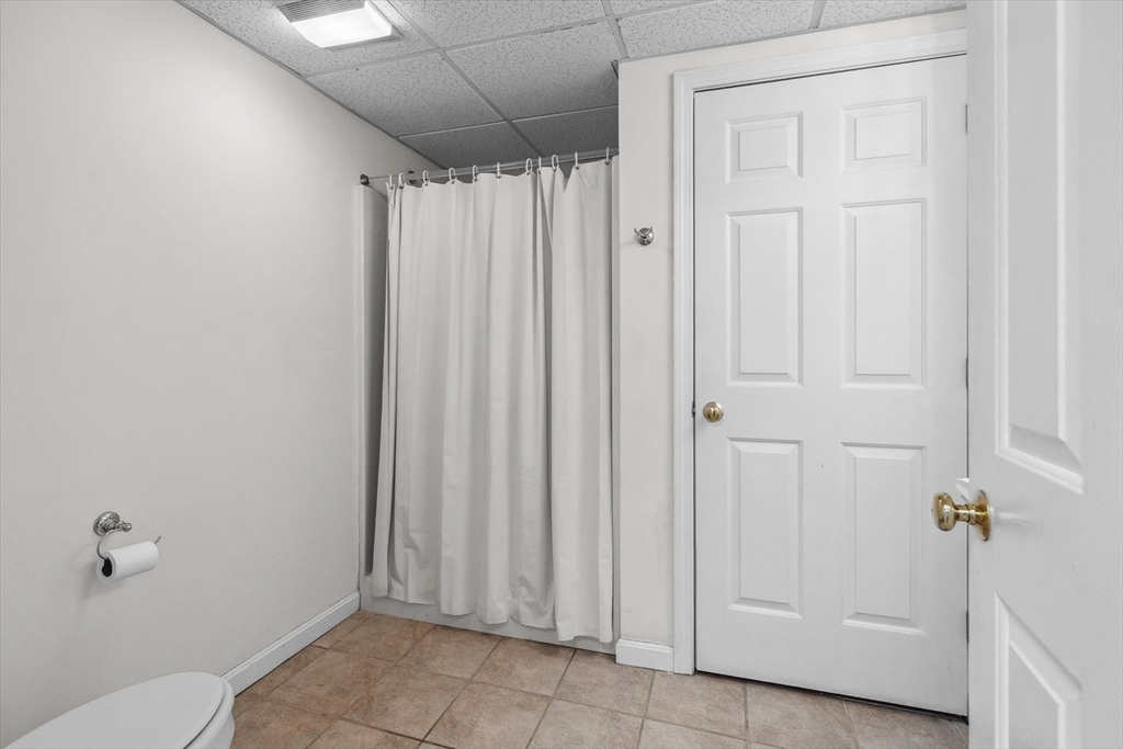 10 Falls Brook Road Hudson, MA 01749 - Photo 34 of 42 a view of a bathroom with a shower