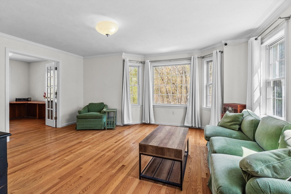 10 Falls Brook Road Hudson, MA 01749 - Photo 6 of 42 a living room with furniture and a wooden floor