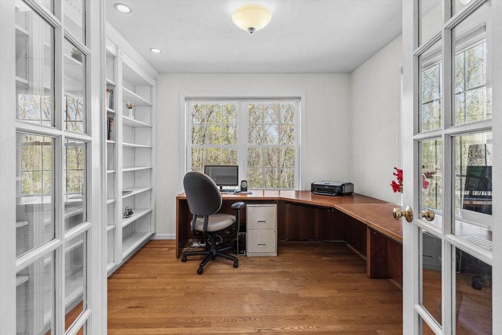 10 Falls Brook Road Hudson, MA 01749 - Photo 8 of 42 a view of a workspace with furniture and a window