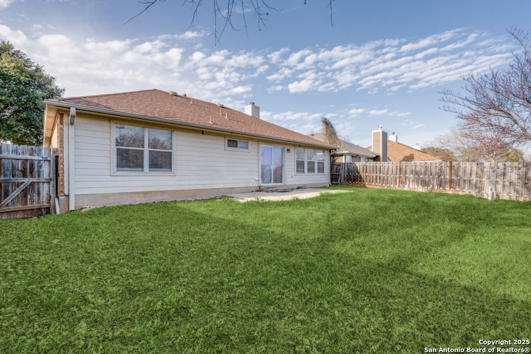 8346 Copperglen Converse, TX 78109 - Photo 15 of 15 a house view with a garden space