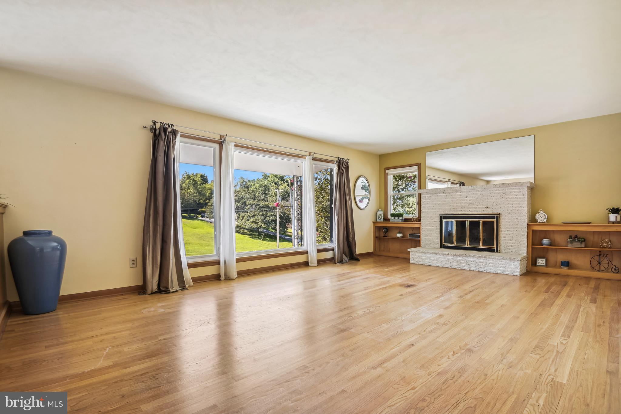 1628 Mayberry Road Westminster, MD 21158 - Photo 14 of 37 Living room with wood floors and fireplace