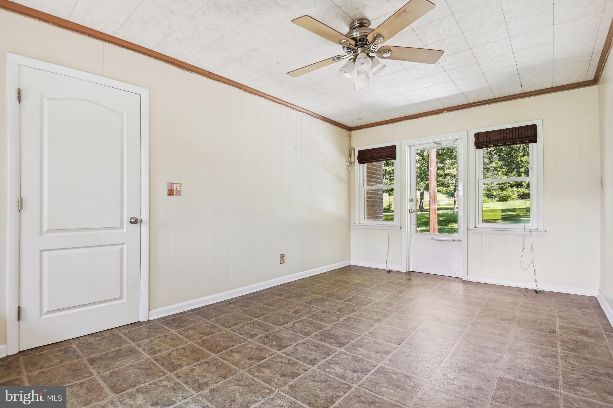 1628 Mayberry Road Westminster, MD 21158 - Photo 36 of 37 Three season room leading from kitchen to garage