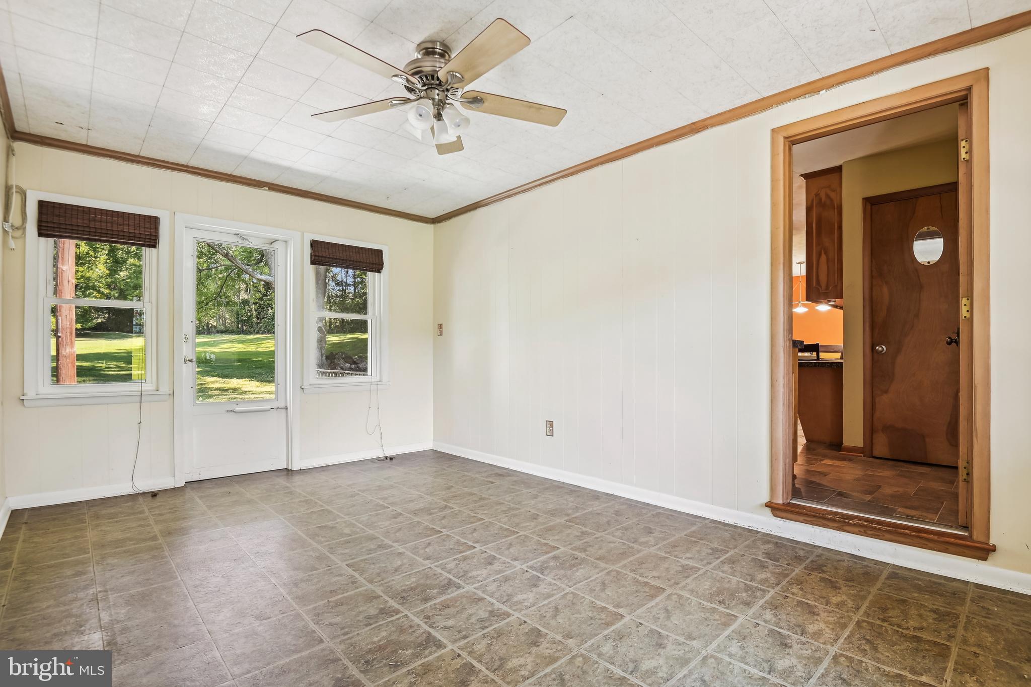 1628 Mayberry Road Westminster, MD 21158 - Photo 4 of 37 From garage into three season room with fan