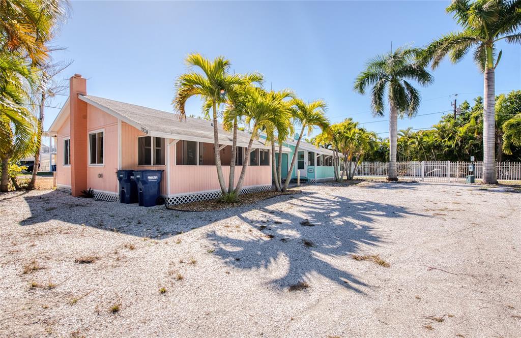 13136 4th Street East Madeira Beach, FL 33708 - Photo 11 of 75 a view of a yard with a house