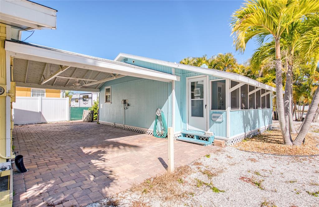 13136 4th Street East Madeira Beach, FL 33708 - Photo 19 of 75 a view of a house with backyard and snow