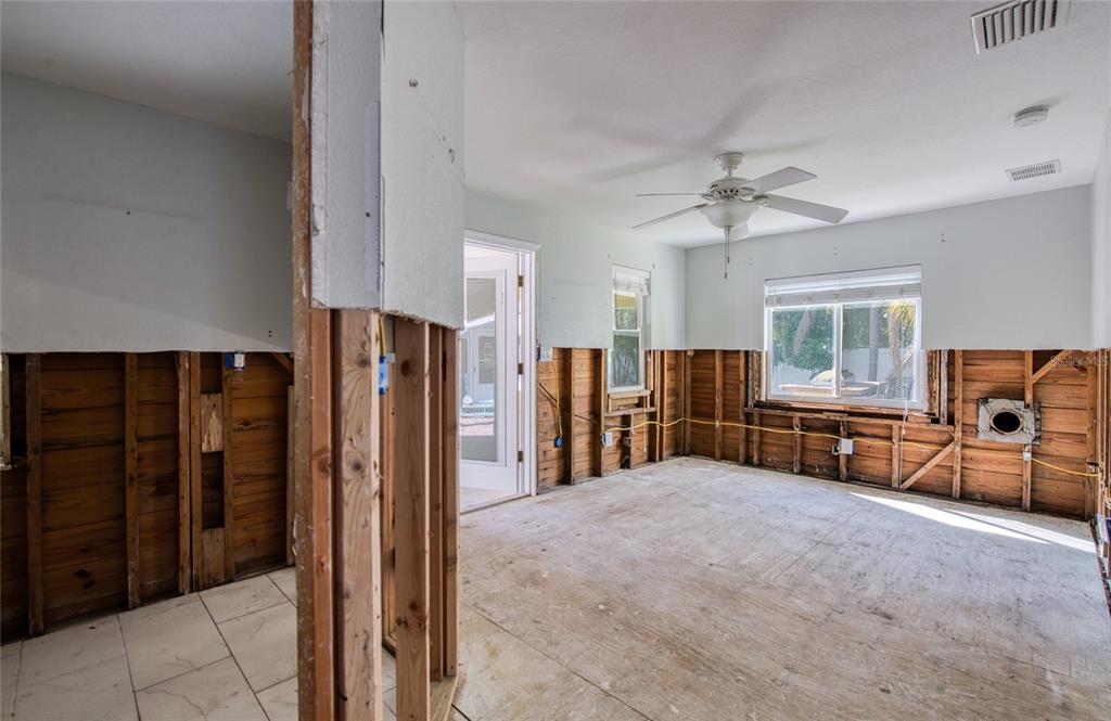 13136 4th Street East Madeira Beach, FL 33708 - Photo 36 of 75 a view of livingroom with furniture and windows
