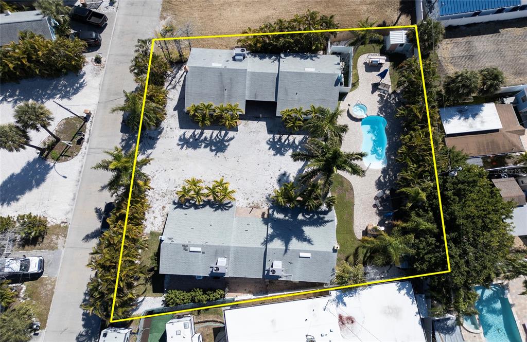 13136 4th Street East Madeira Beach, FL 33708 - Photo 70 of 75 an aerial view of house with a yard