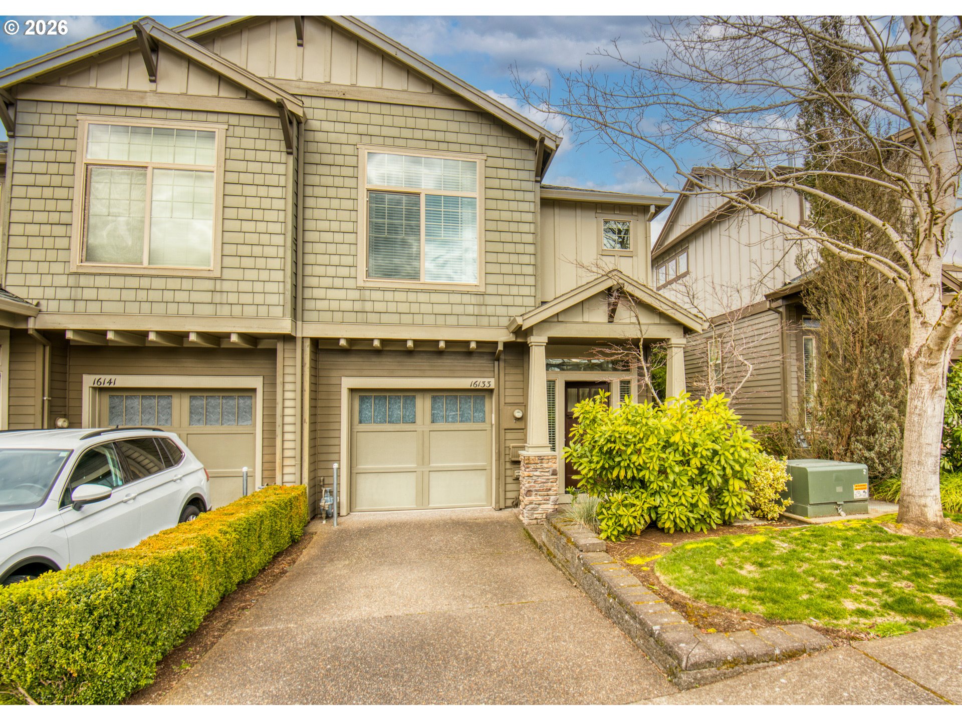 16133 Northwest Hildago Lane Portland, OR 97229 - Photo 1 of 29 a front view of a house with garden