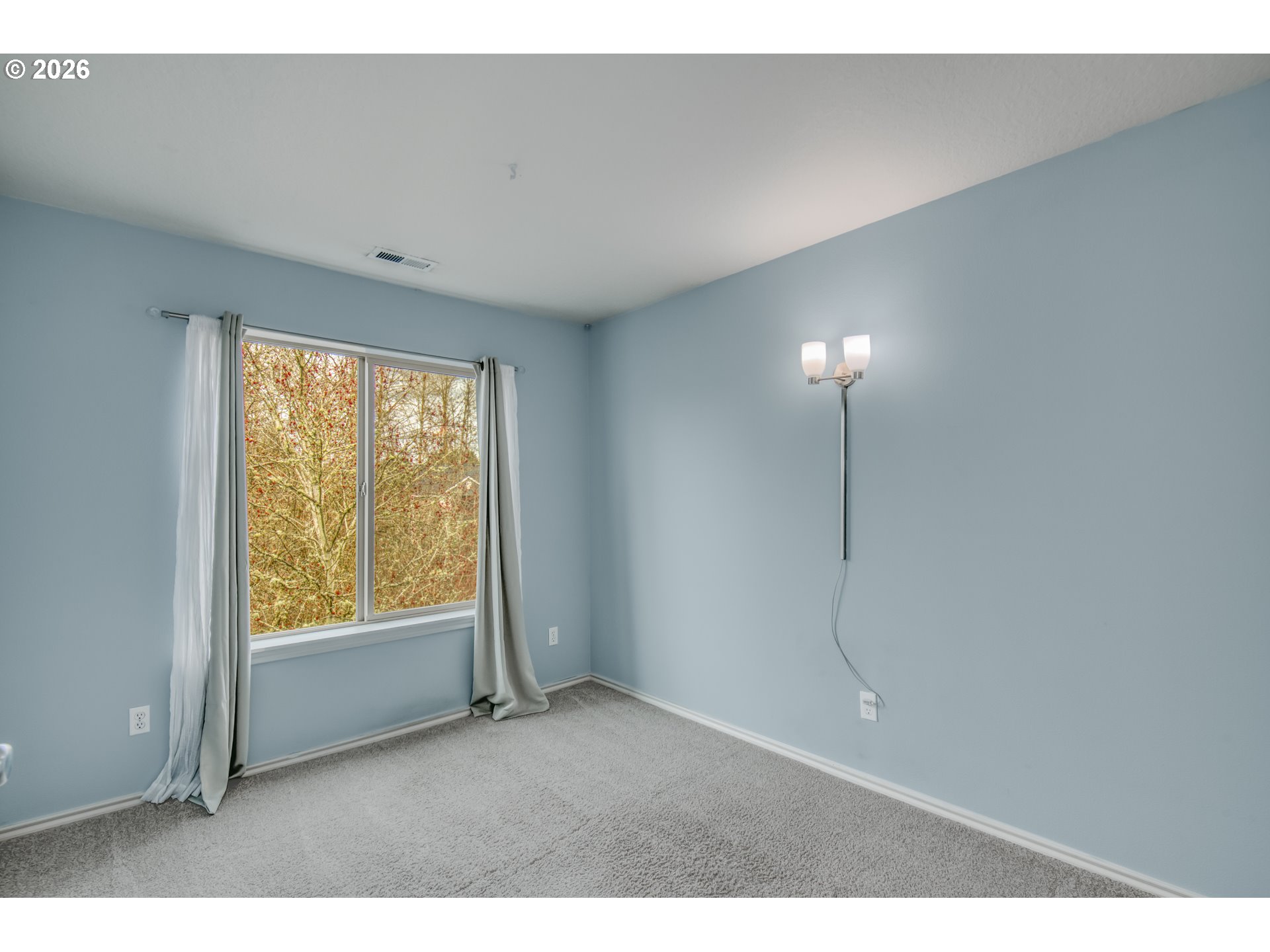 16133 Northwest Hildago Lane Portland, OR 97229 - Photo 14 of 29 a view of an empty room with a window