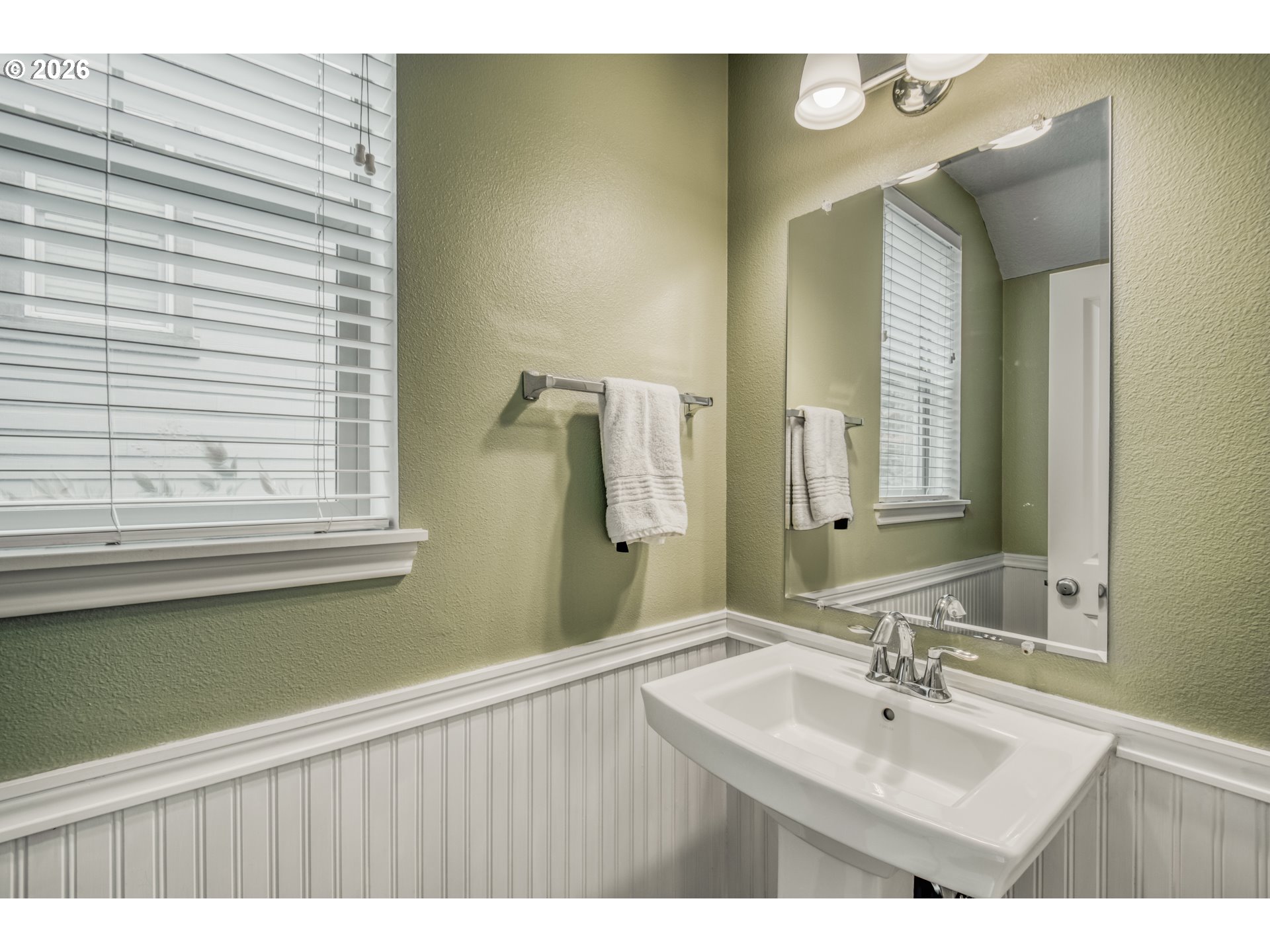 16133 Northwest Hildago Lane Portland, OR 97229 - Photo 8 of 29 a bathroom with a sink and a mirror