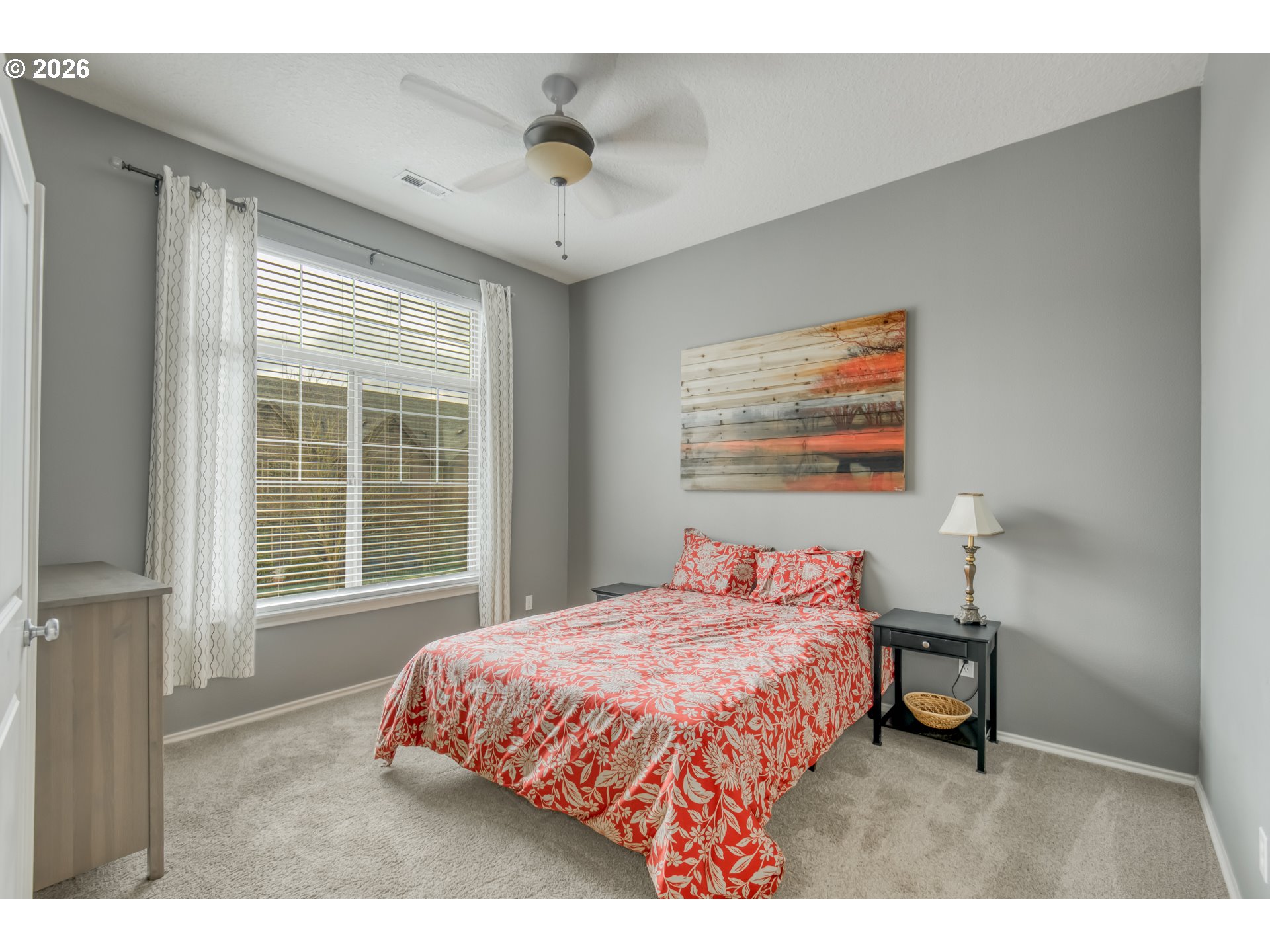 16133 Northwest Hildago Lane Portland, OR 97229 - Photo 9 of 29 a bedroom with a bed and a window