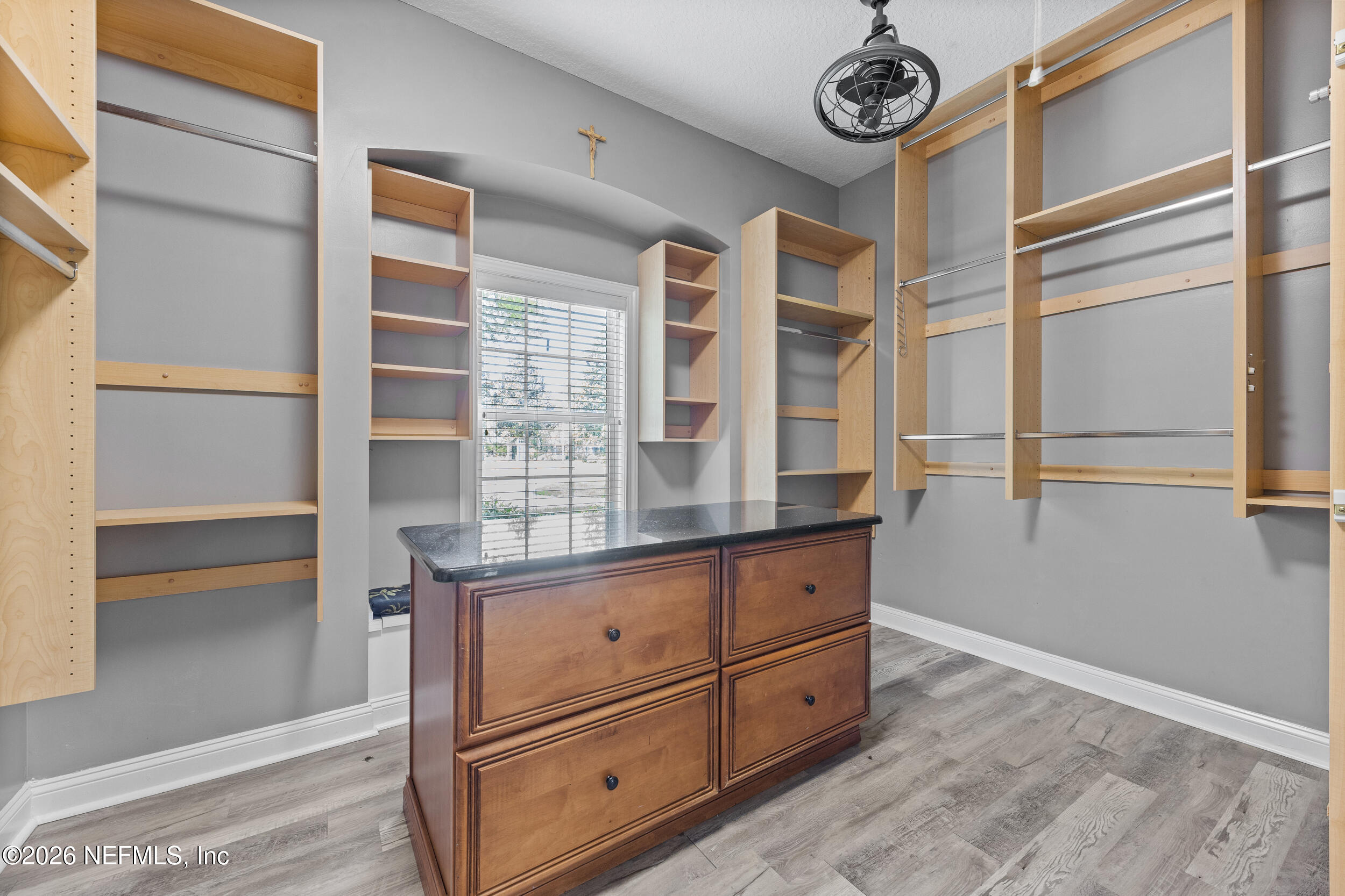 3225 Bishop Estates Road St. Johns, FL 32259 - Photo 28 of 90 a view of walk in closet with empty racks