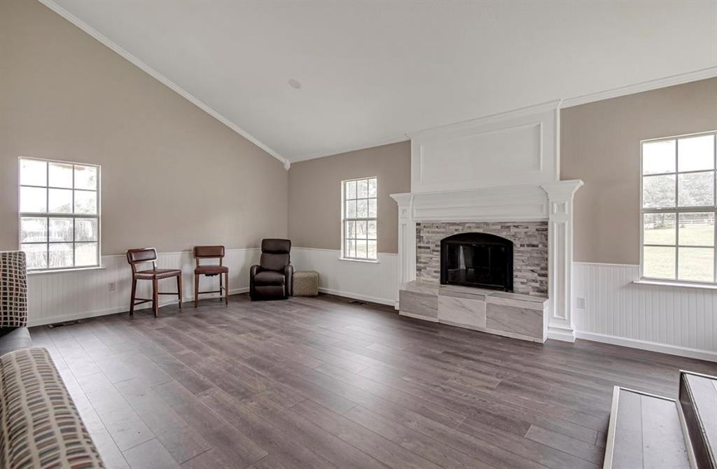 3952 J J Rendon Road Burleson, TX 76028 - Photo 5 of 25 Beautifully remodeled fireplace, new floor covering and fresh paint.