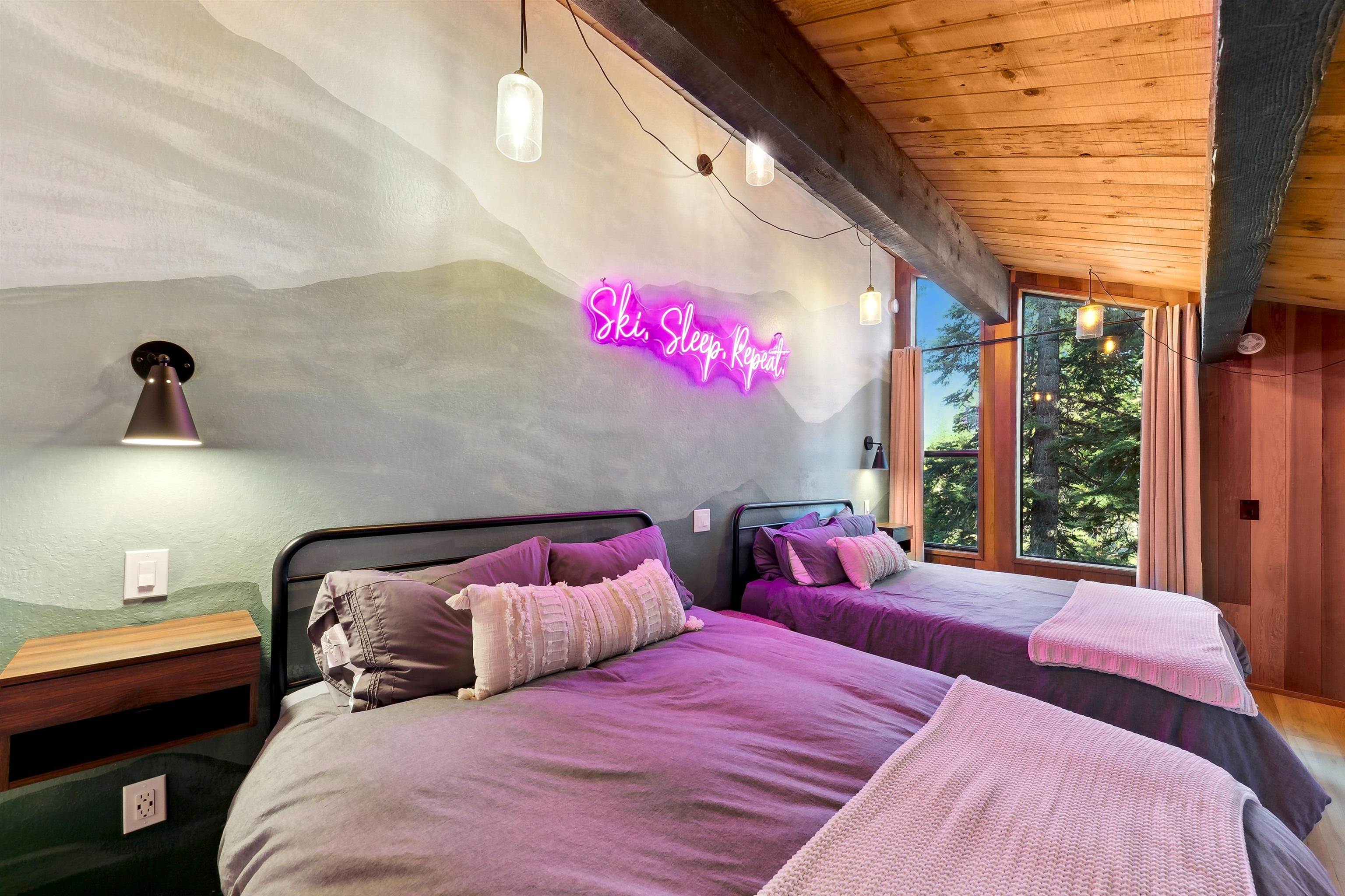 1001 Commonwealth Drive, Unit 218 Kings Beach, CA 96143 - Photo 12 of 28 a bedroom with a bed and wooden floor