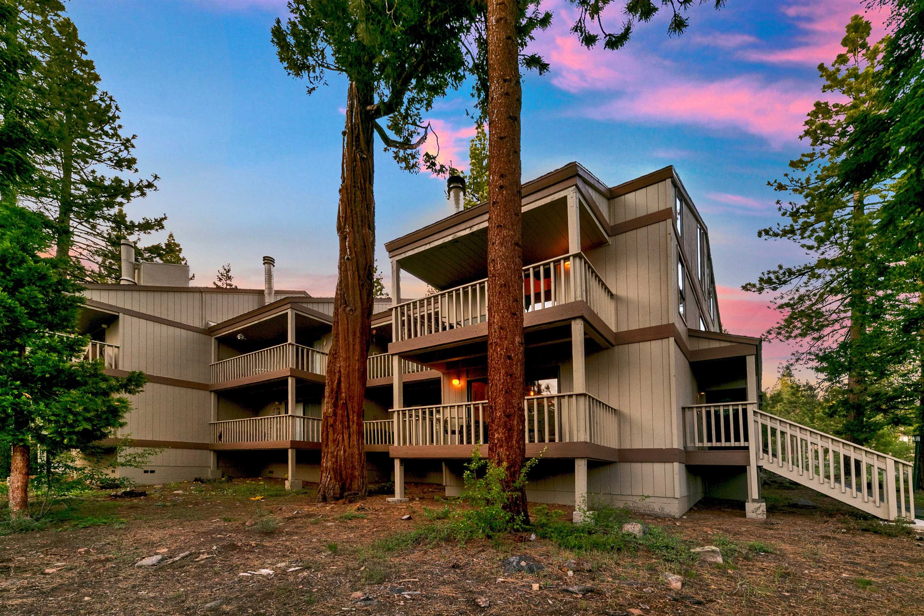 1001 Commonwealth Drive, Unit 218 Kings Beach, CA 96143 - Photo 16 of 28 a view of a house with a yard and deck