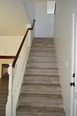 a view of wooden floor and a small space