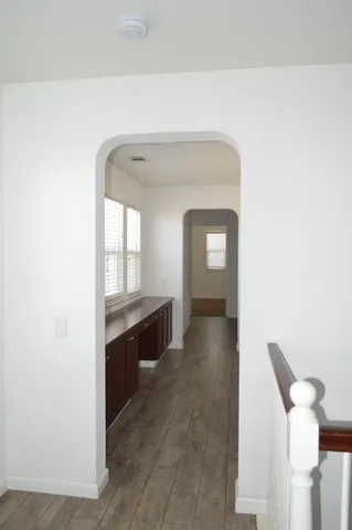 a bathroom with a bath tub with a shower