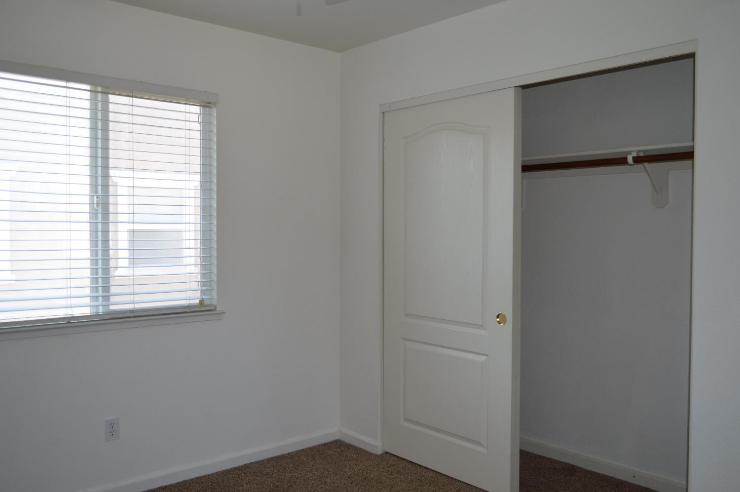 4227 Ivory Lane Turlock, CA 95382 - Photo 34 of 60 a view of an empty room with a window