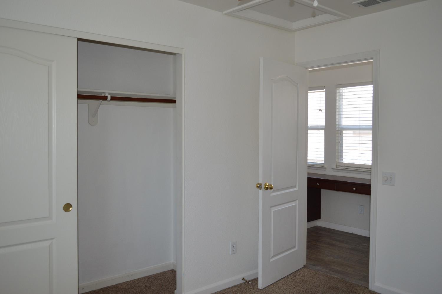 4227 Ivory Lane Turlock, CA 95382 - Photo 36 of 60 a view of an empty room with closet and a window
