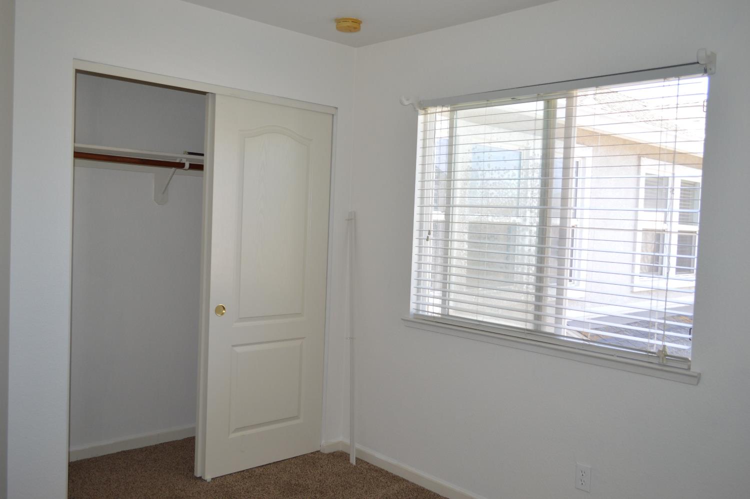 4227 Ivory Lane Turlock, CA 95382 - Photo 38 of 60 a view of an empty room with a window