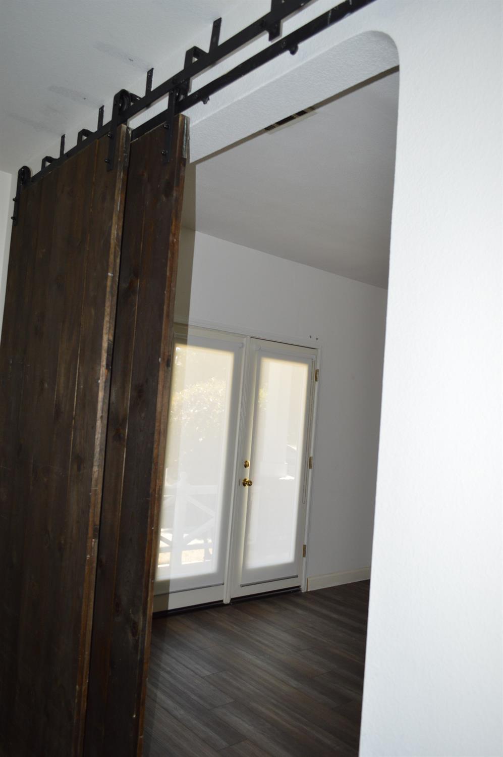 4227 Ivory Lane Turlock, CA 95382 - Photo 6 of 60 a view of front door with wooden floor