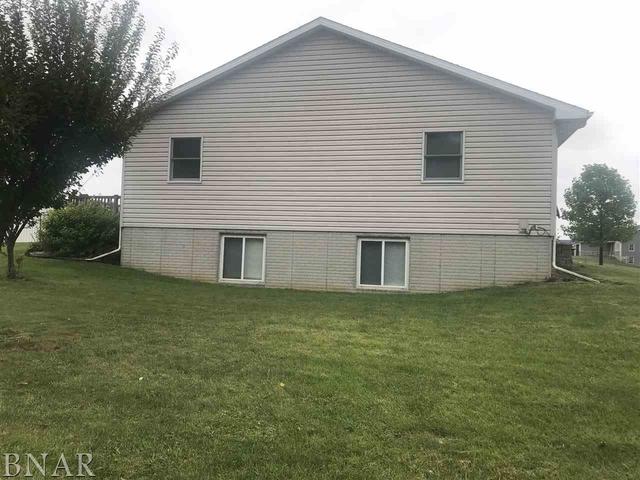 9563 Clintonia Road Clinton, IL 61727 - Photo 34 of 45 a view of a house with a yard