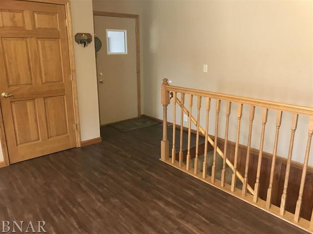 9563 Clintonia Road Clinton, IL 61727 - Photo 10 of 45 a view of a porch with wooden floor