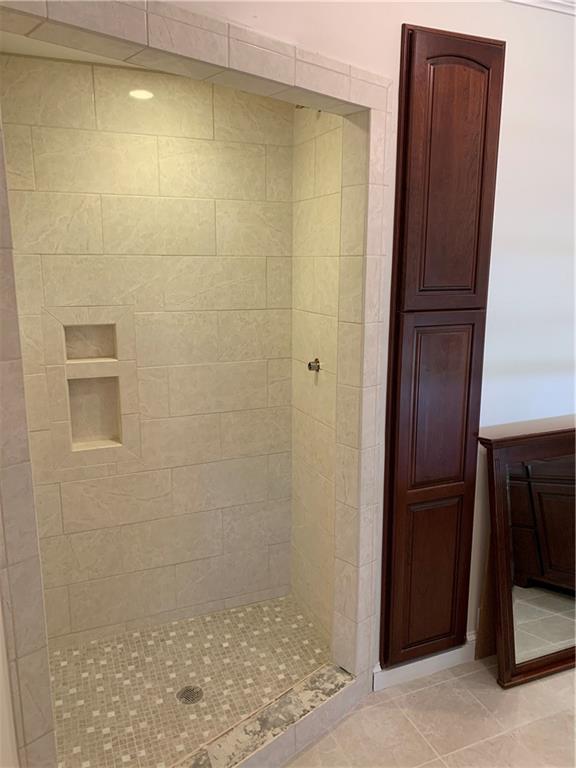12833 Conneaut Lake Road Conneaut Lake, PA 16316 - Photo 18 of 25 a bathroom with a shower