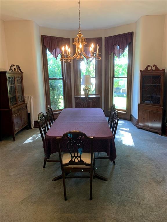 12833 Conneaut Lake Road Conneaut Lake, PA 16316 - Photo 2 of 25 a dining room with furniture and window