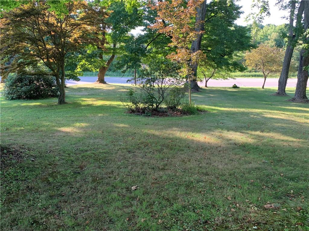 12833 Conneaut Lake Road Conneaut Lake, PA 16316 - Photo 24 of 25 a view of yard with trees