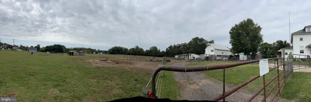 a view of a bench in front of building