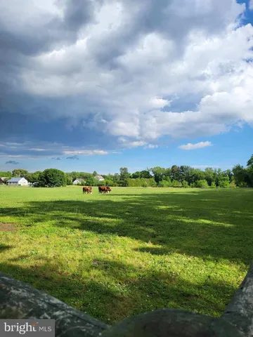 a view of a golf course with a yard
